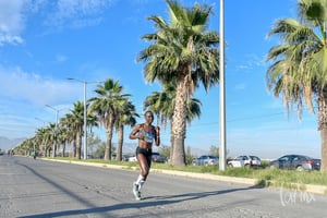 Primera mujer | Medio Maratón 21K Autocentro Autopop